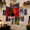 A set of 15 cricket-themed wall posters arranged in a corner display on a white wall, featuring players like Thacker, Benson, and Samurki, with dramatic red and black backgrounds.