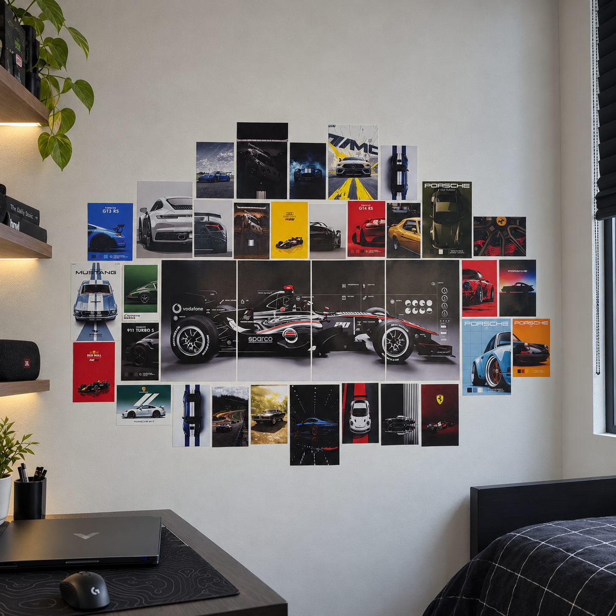 A wall collage of various automotive posters and stickers arranged in a geometric pattern on a light gray wall in a modern bedroom setting.