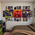 A wall collage of soccer poster prints displayed above a bed in a bedroom. The large central posters feature Lionel Messi, Neymar, and Lionel Messi's 'GREAT' match-up, surrounded by smaller soccer player posters including C罗, Mbappé, and others.