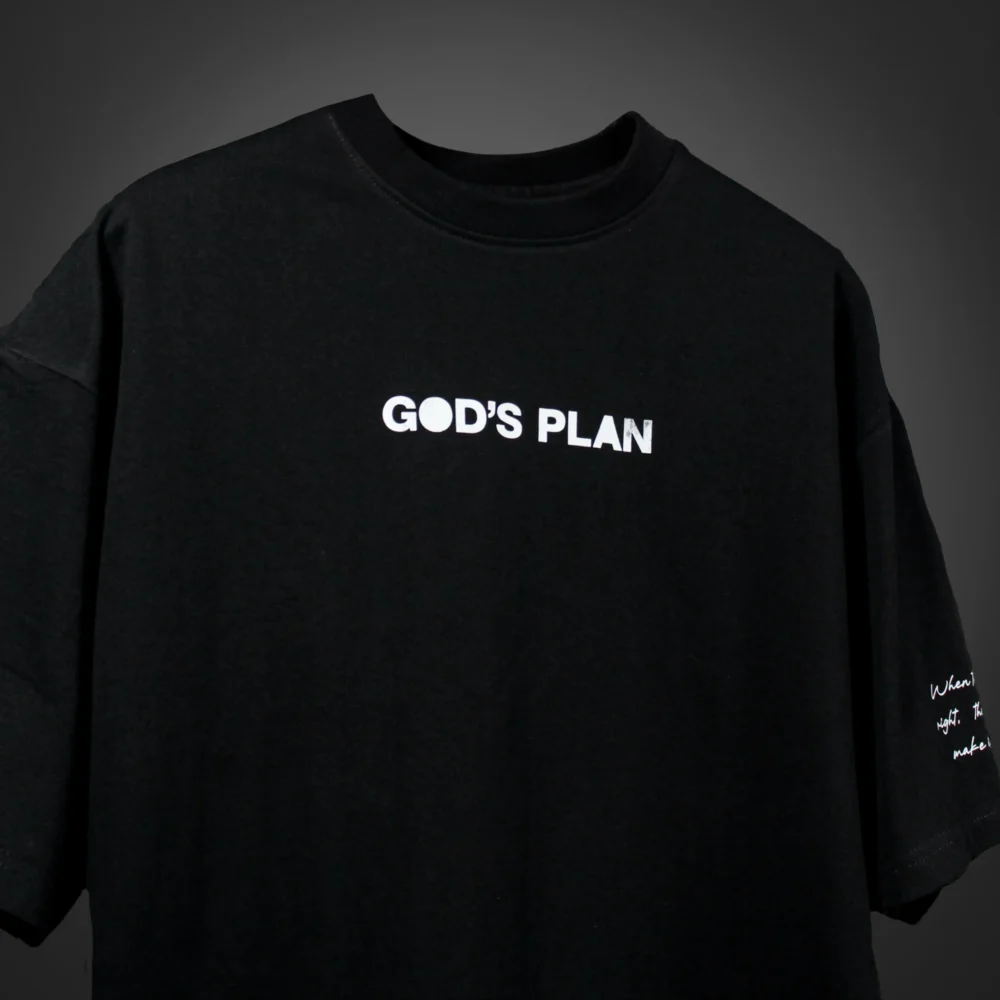 Front view of the GOD'S PLAN t-shirt with clean typography centered on the chest. Premium streetwear t-shirt | oversized t-shirt by BLUMUN