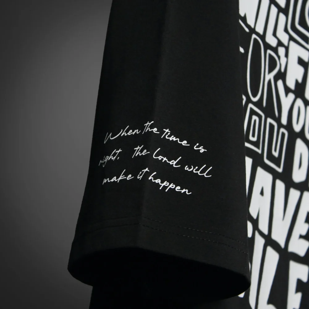 Left Sleeve close-up of handwritten scripture quote: "When the time is right, the Lord will make it happen." Premium streetwear t-shirt | oversized t-shirt by BLUMUN